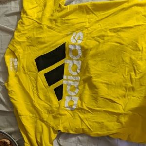 Yellow white and black Adidas shirt